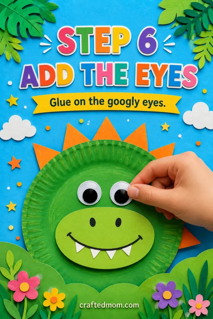 DIY Paper plate dinosaur craft - Step 6: Glue on the Head and Neck