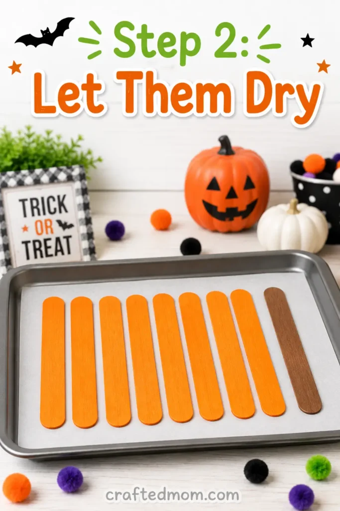 Easy Halloween popsicle stick pumpkin craft for kids - Step 2: Let Them Dry
