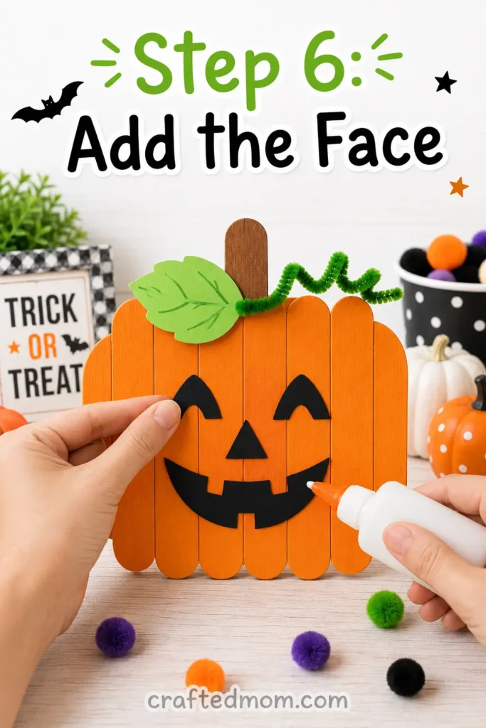 Easy Halloween popsicle stick pumpkin craft for kids - Step 6: Add the Face