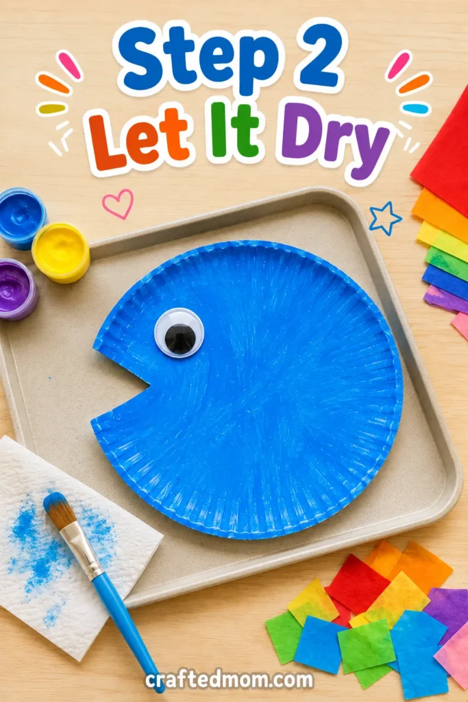 Easy Toddler paper plate rainbow fish craft - Step 2: Let It Dry
